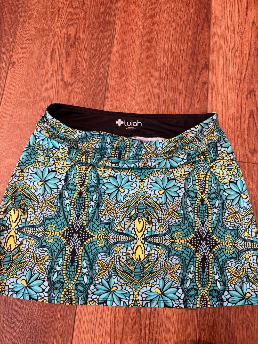 Tula Teal, Yellow & Black Printed Athletic Mini Skirt sz M